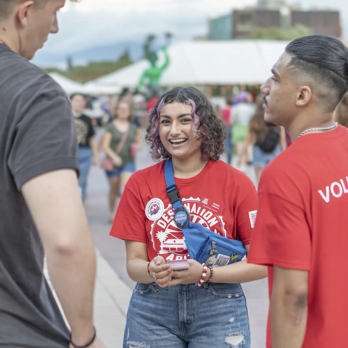 Destination Arizona Leaders, Ayleth and Hassan chat with a student during Evening Oasis.